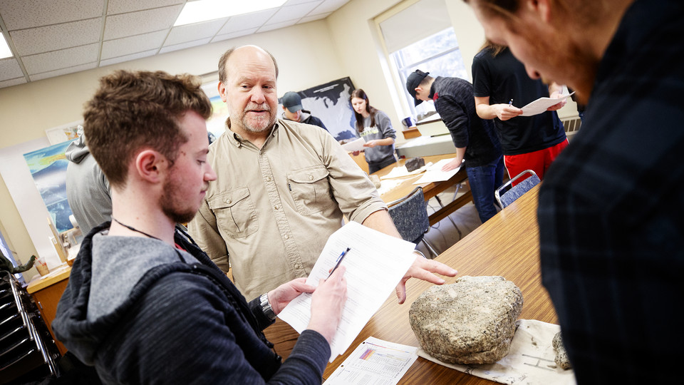  Nebraska’s David Harwood answers a question from Jackson Belva during a Geology 125 course. Harwood served as a principal investigator in the National Science Foundation-funded SALSA project.