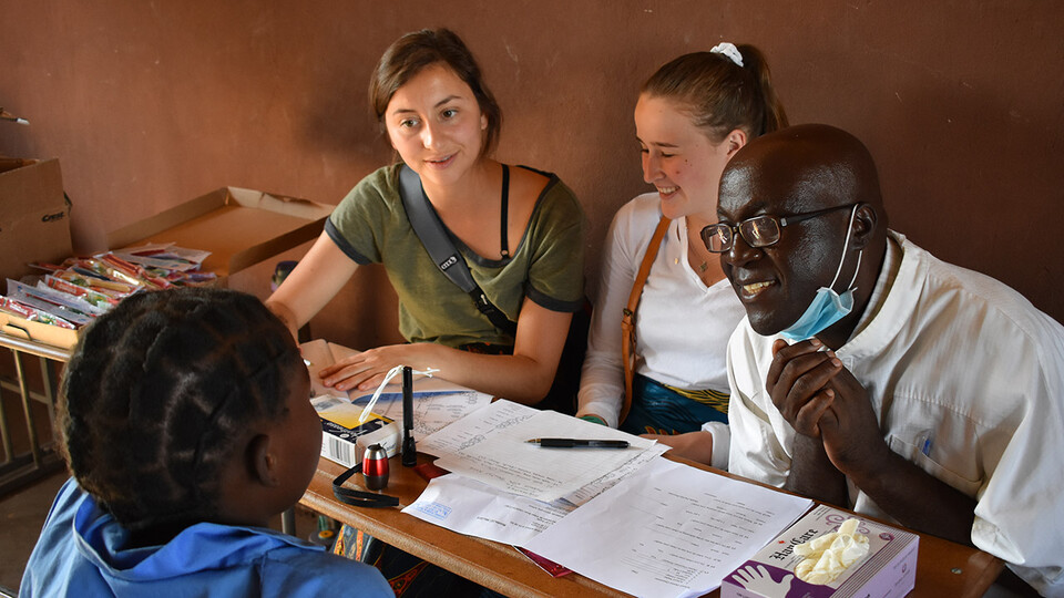 Two University of Nebraska–Lincoln students sit in on a local meeting during their “Food Security, Health and Nutrition” program in Zambia and Ethiopia in summer 2019. Led by Mary Willis, the study abroad program has included 15 Husker Gilman Scholars since its inception in 2014.