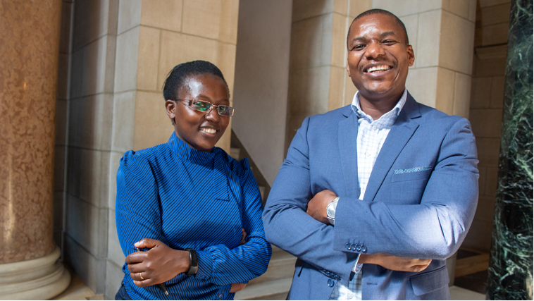 Two fellows from the 2019 Nebraska Institute of the Mandela Washington Fellowship for Young African Leaders stand in the Nebraska State Capitol.