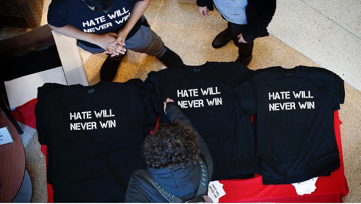 Nebraska students hand out “Hate Will Never Win” T-shirts in the Jackie Gaughan Multicultural Center before a campus rally in February 2018