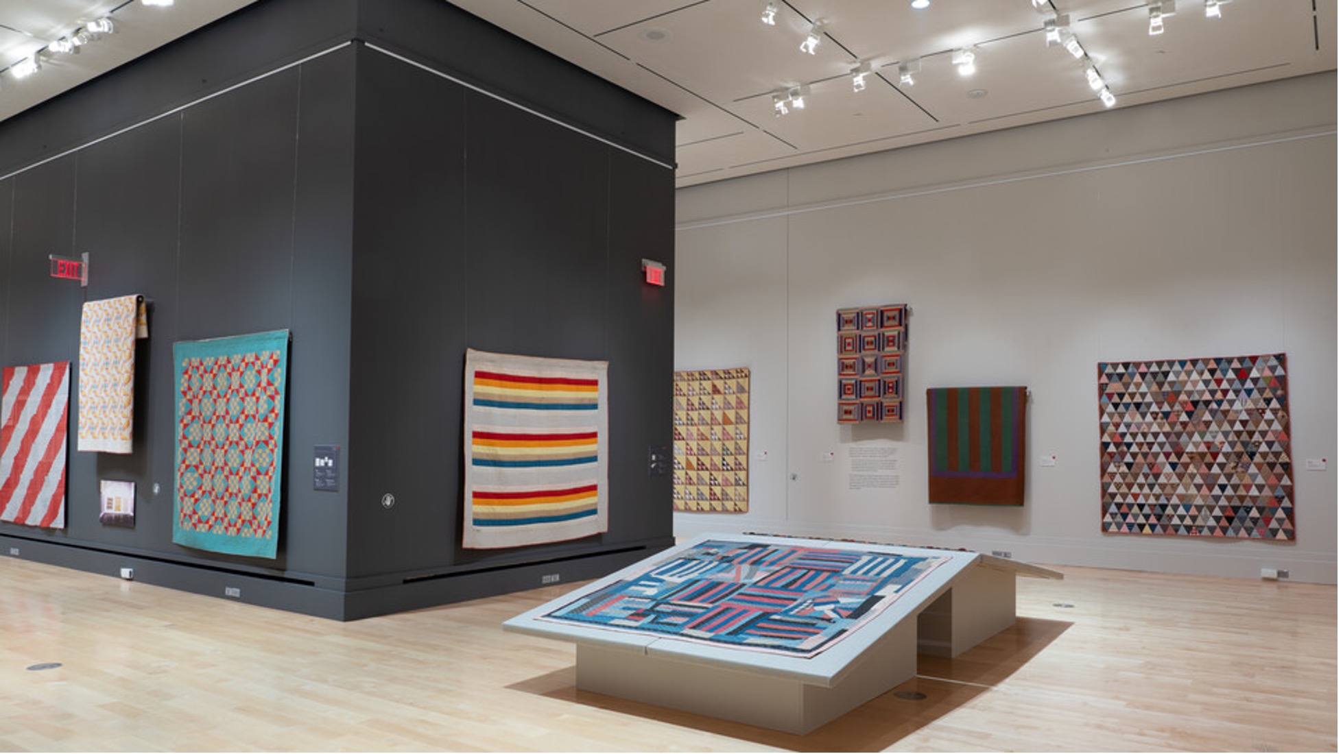 Quilts from the Whitney exhibition are displayed at the International Quilt Museum.