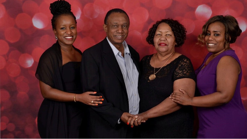 The Ngaruiya family, including UNL alumnae and sisters Christine Ngaruiya, M.D., (left) and Katherine Ngaruiya, Ph.D., (right) together with their parents, Peter and Phyllis Ngaruiya, (center) established a fund to provide annual research awards to undergraduate students at UNL. 