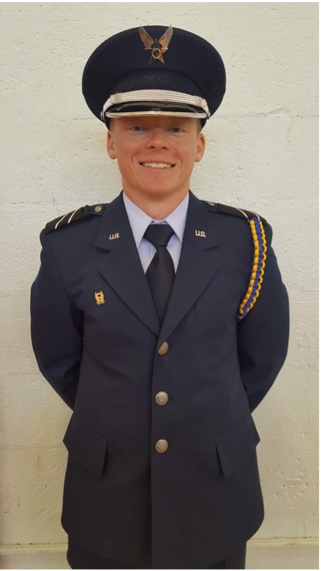 Zachary Ostrander poses with an Air Force ROTC cadet uniform.