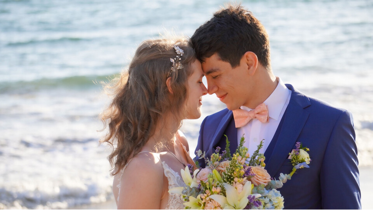 Courtney Van Hoosen, global outreach officer in Nebraska’s Office of Global Strategies, is sharing her gratitude for her recent marriage to partner Nurik Makhmudzoda. They are seen at their marriage ceremony in California. 