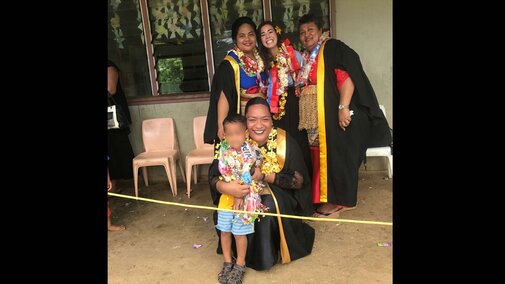 Dreeszen in cap and gown with group