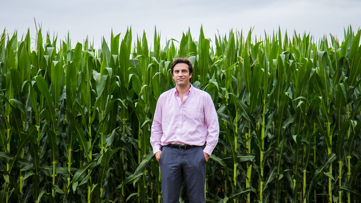 Patricio Grassini, associate professor of agronomy and horticulture at Nebraska, stands in front of a corn field.