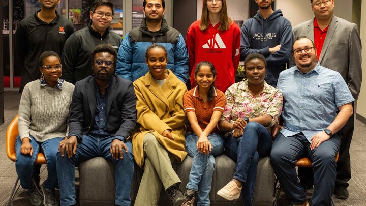 ISAB members pose for picture in Global Education Center at UNL