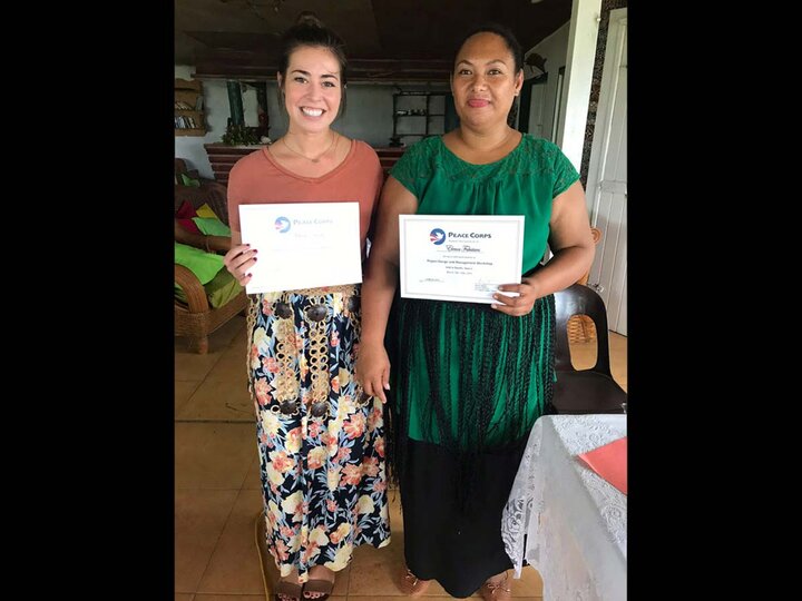 Michaela Dreezen and another holding certificates