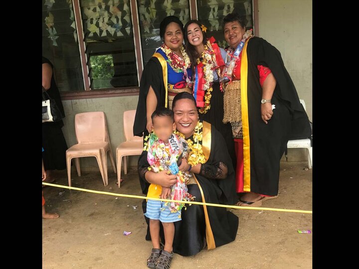 Dreeszen in cap and gown with group