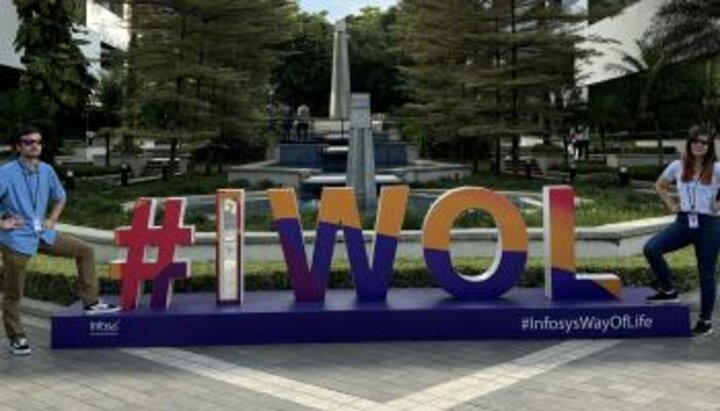 EMA students standing by #IWOL sign in India